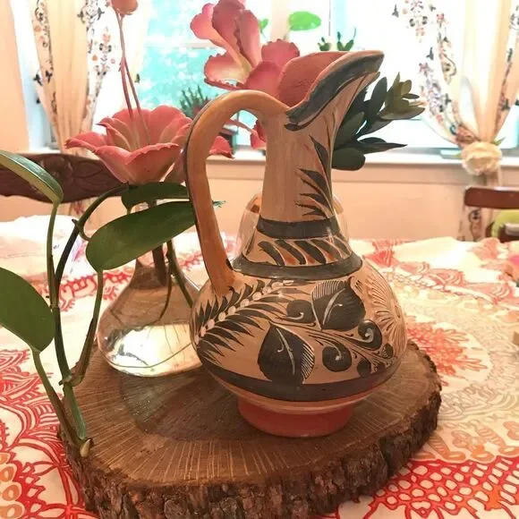 Antique hand painted pottery pitcher